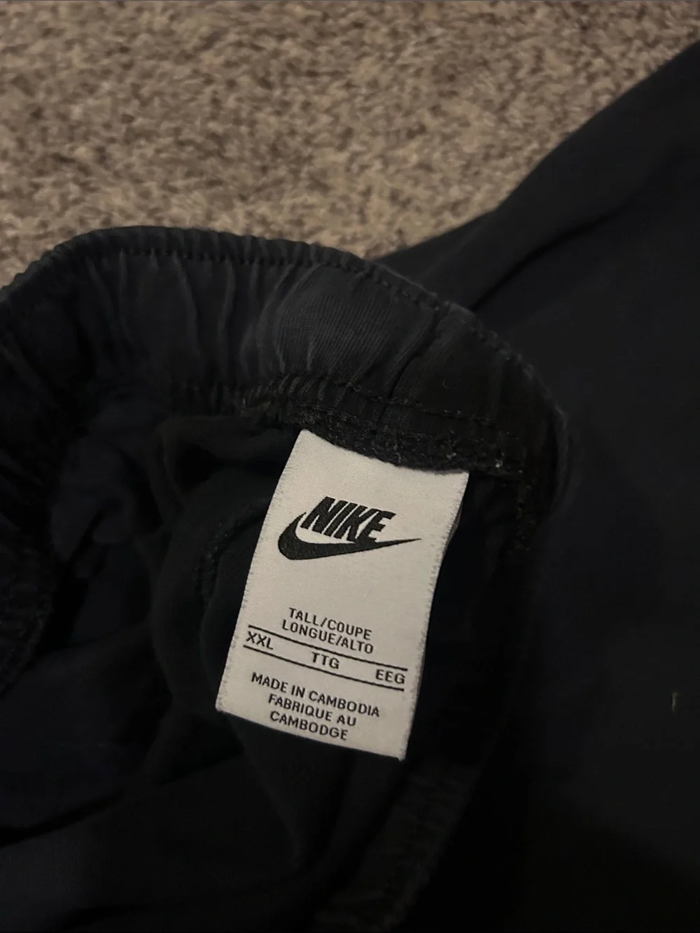 Nike Men's Black Jogger Sweatpants with White Swoosh